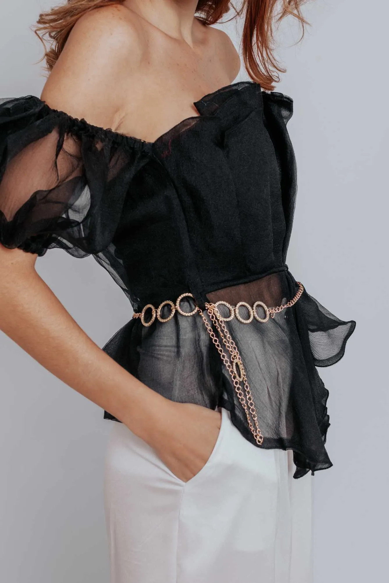 Raven Peplum Top